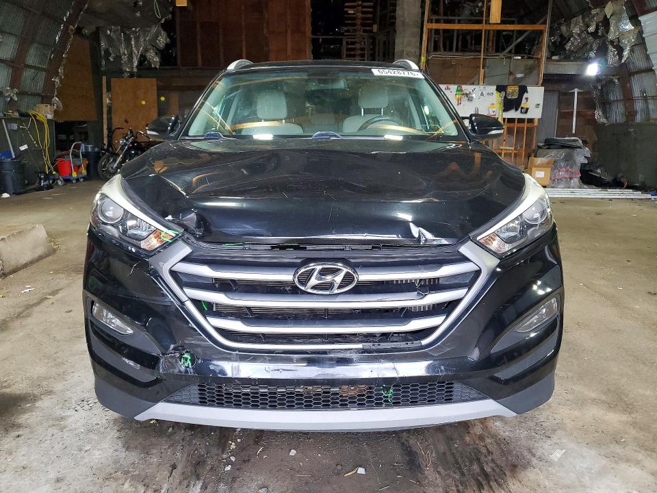 Photo 5 from auction – 2017 HYUNDAI TUCSON with VIN KM8J3CA26HU532043