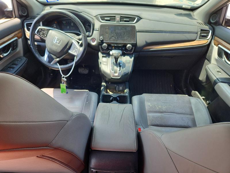 Photo 8 from auction – 2017 HONDA CR-V with VIN 7FARW1H99HE028427