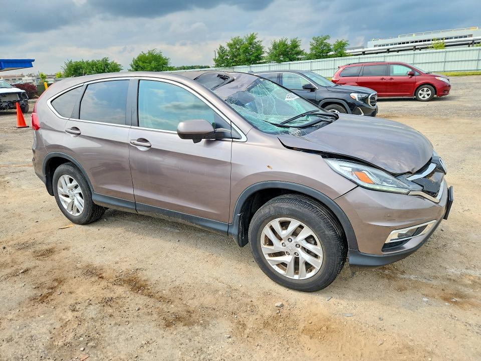 Photo 4 from auction – 2015 HONDA CR-V with VIN 5J6RM4H51FL072961