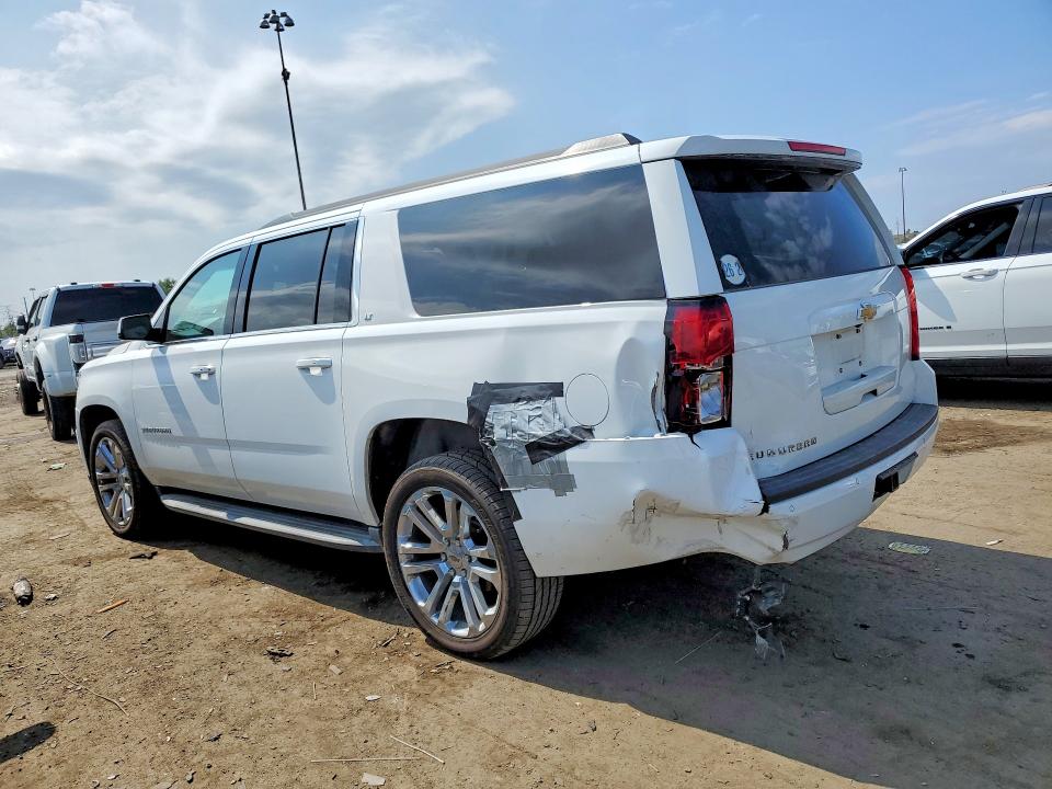 Photo 2 from auction – 2016 CHEVROLET SUBURBAN with VIN 1GNSKHKC1GR229311