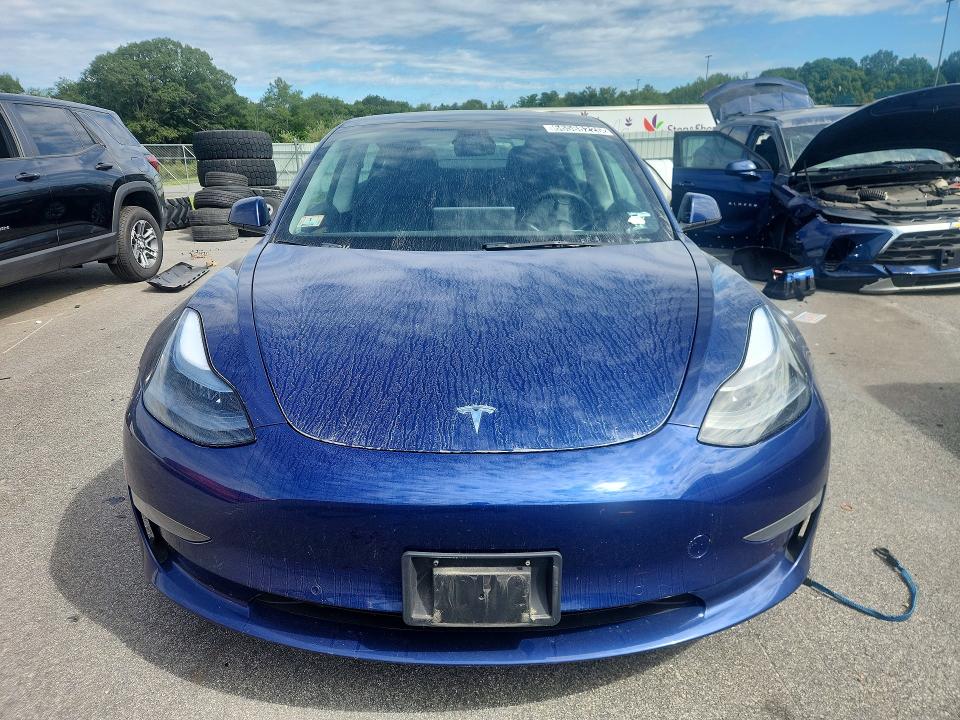 Photo 5 from auction – 2022 TESLA MODEL 3 with VIN 5YJ3E1EA1NF371277