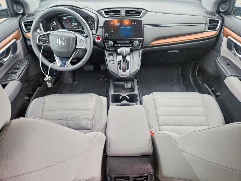 Photo 8 from auction – 2018 HONDA CR-V with VIN 7FARW2H51JE013297