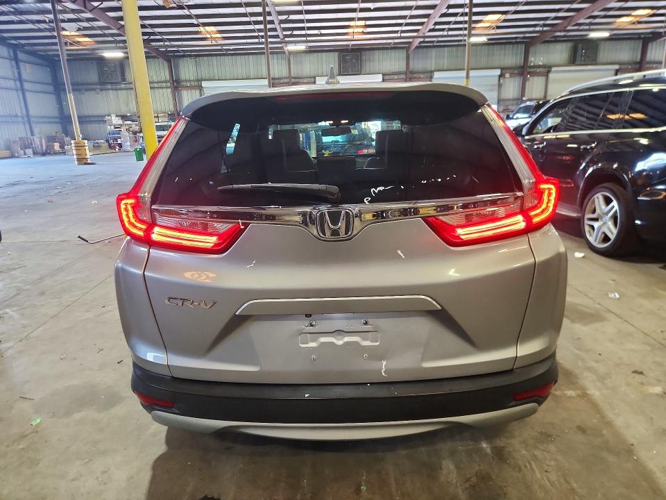 Photo 6 from auction – 2018 HONDA CR-V with VIN 7FARW1H81JE015085