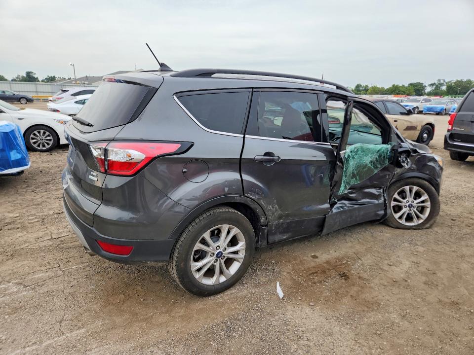 Photo 3 from auction – 2018 FORD ESCAPE with VIN 1FMCU0HD9JUA90795