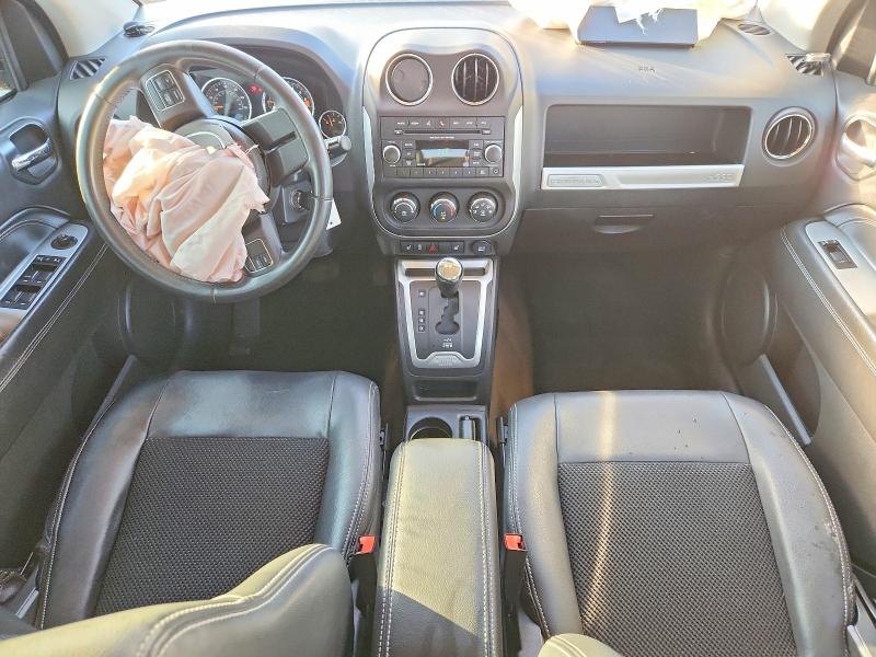 Photo 8 from auction – 2014 JEEP COMPASS with VIN 1C4NJCEA9ED647552