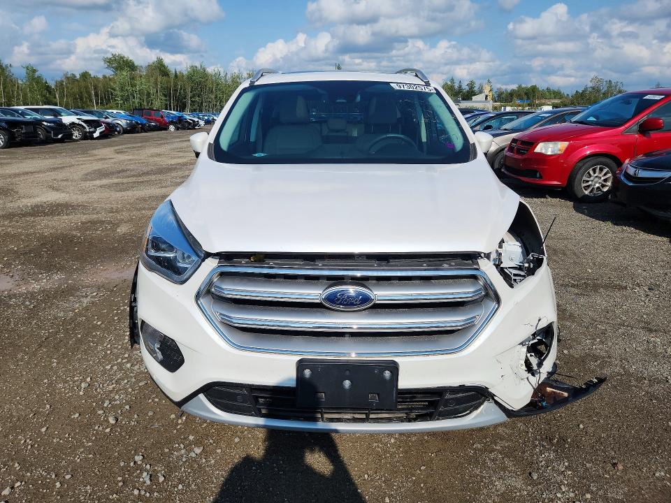 Foto 5 de la subasta – 2017 FORD ESCAPE con VIN 1FMCU9J98HUB69640