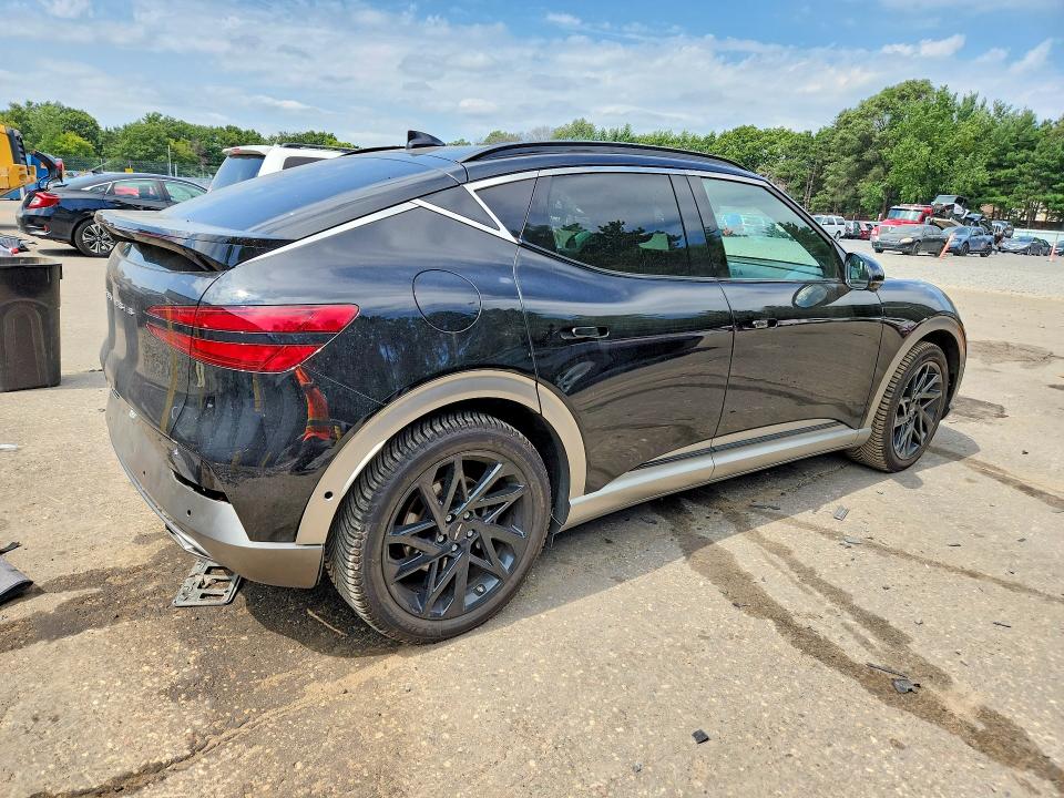 Photo 3 from auction – 2023 GENESIS GV60 with VIN KMUKCDTC2PU010476