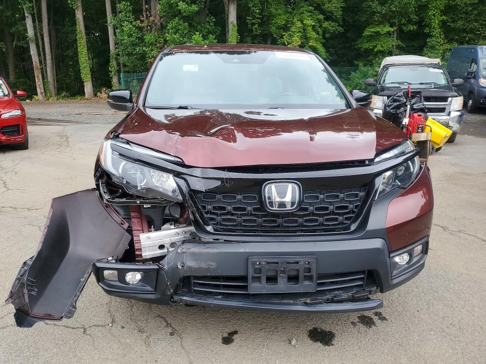 Photo 5 from auction – 2021 HONDA PASSPORT with VIN 5FNYF8H56MB035312