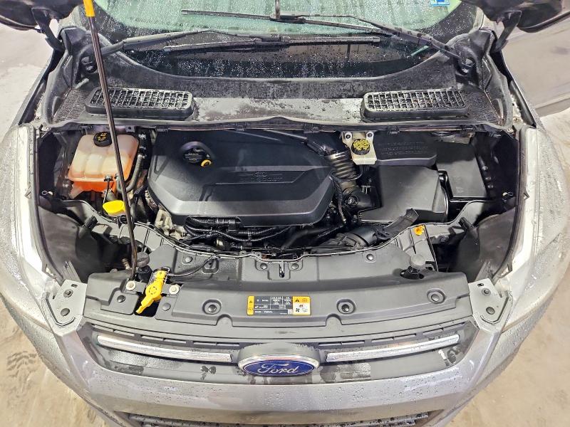 Photo 12 from auction – 2014 FORD ESCAPE with VIN 1FMCU9GX7EUB23671
