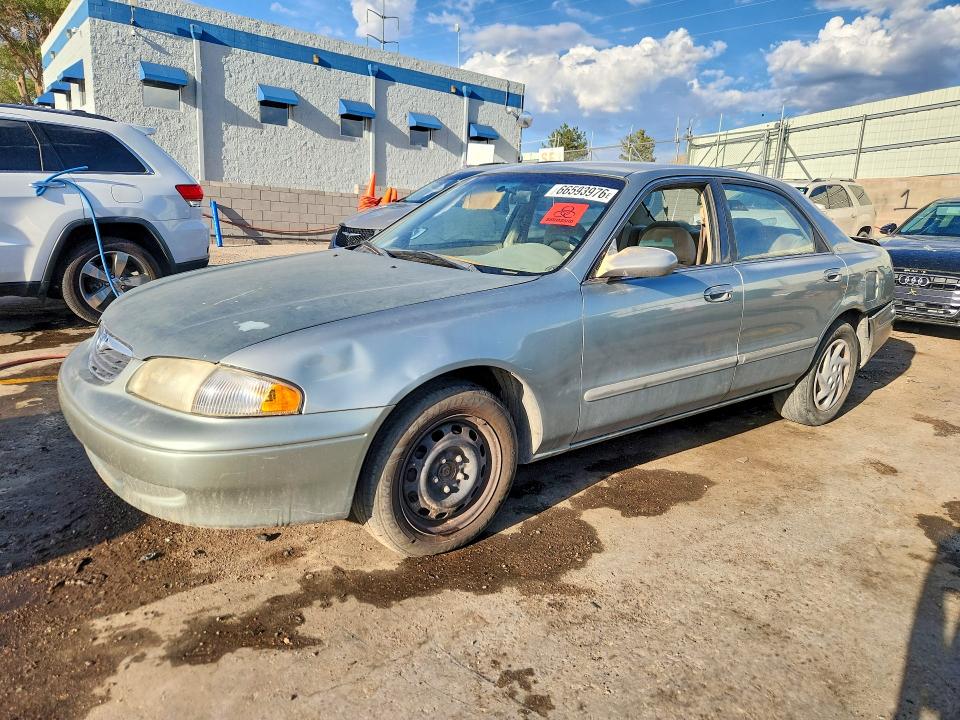 MAZDA 626 1999 с VIN 1YVGF22D4X5901243 - Снимка от търг