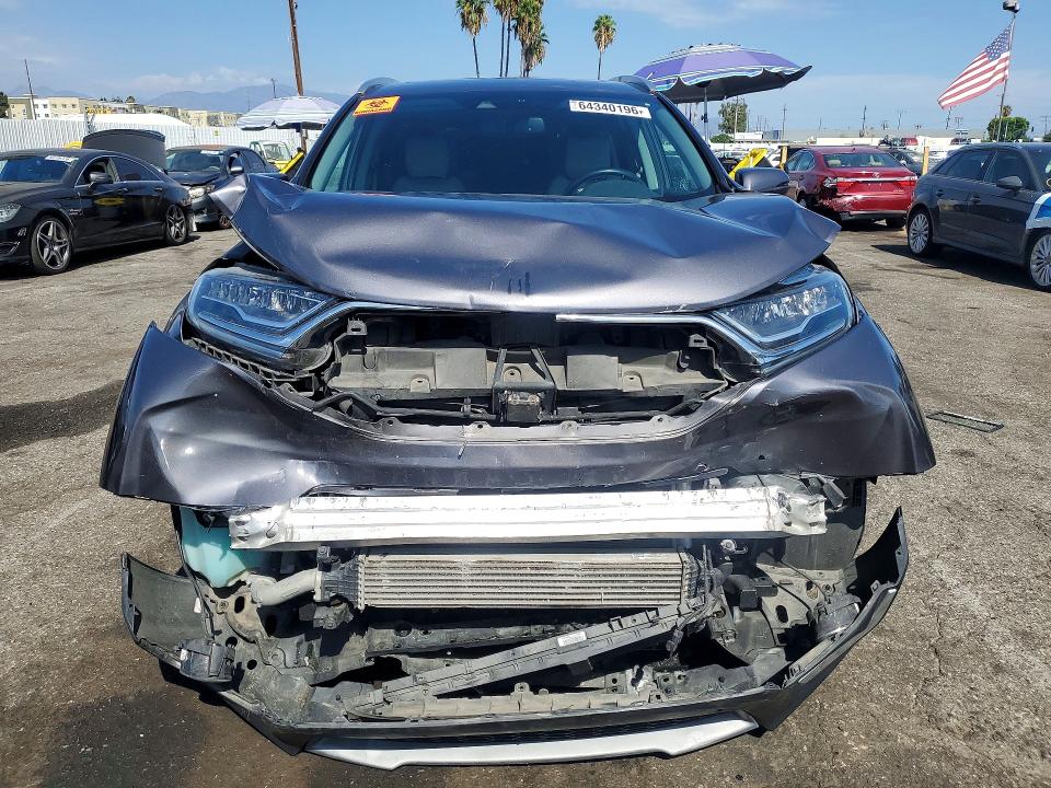 Photo 5 from auction – 2017 HONDA CR-V with VIN 7FARW1H93HE028892