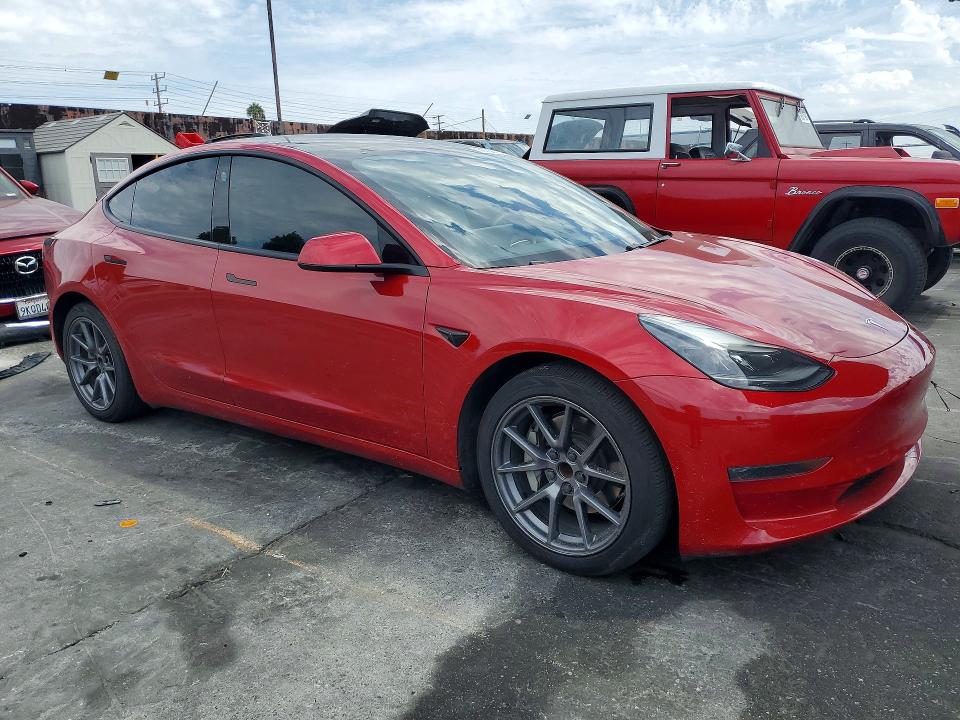 Photo 4 from auction – 2021 TESLA MODEL 3 with VIN 5YJ3E1EA5MF921434