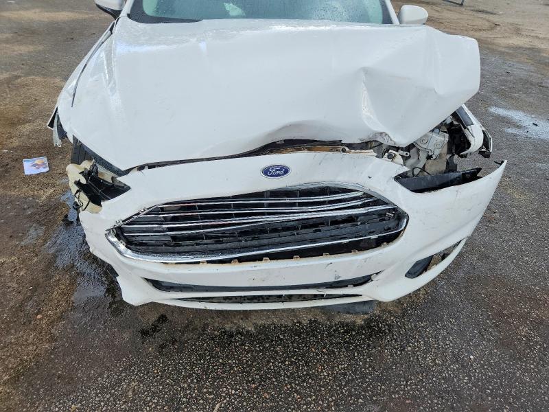 Photo 11 from auction – 2016 FORD FUSION with VIN 3FA6P0G75GR109675