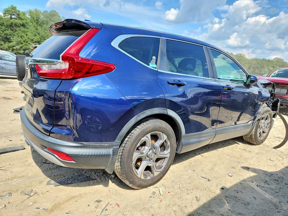 Photo 3 from auction – 2018 HONDA CR-V with VIN 5J6RW1H57JA004564
