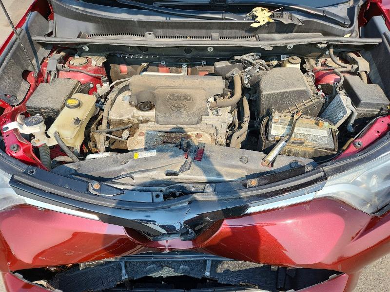 Photo 12 from auction – 2018 TOYOTA RAV4 with VIN 2T3RFREV0JW813415