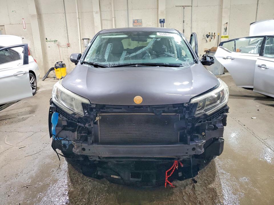 Photo 5 from auction – 2015 HONDA CR-V with VIN 3CZRM3H56FG711083