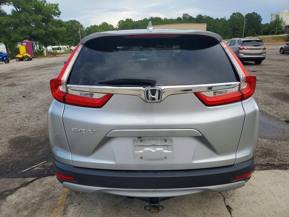 Photo 6 from auction – 2017 HONDA CR-V with VIN 7FARW1H55HE028549