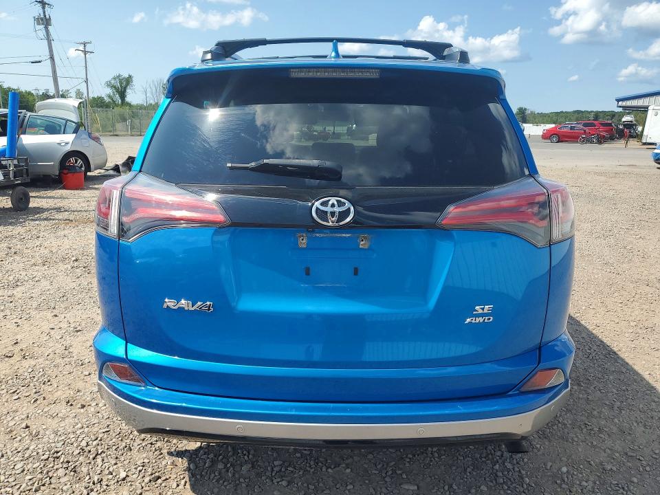 Photo 6 from auction – 2018 TOYOTA RAV4 with VIN 2T3JFREV7JW814753