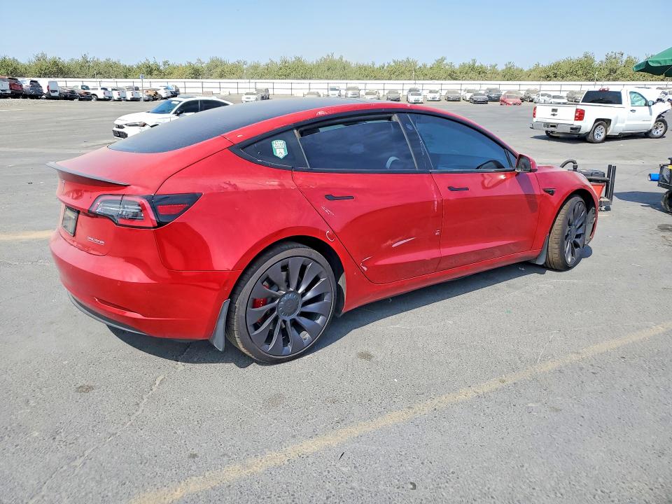 Photo 3 from auction – 2021 TESLA MODEL 3 with VIN 5YJ3E1EC5MF985006