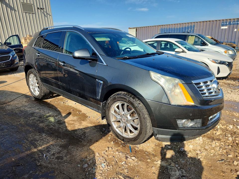Photo 4 from auction – 2014 CADILLAC SRX with VIN 3GYFNDE31ES685173