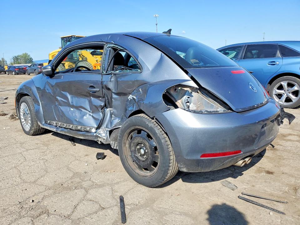 Photo 2 from auction – 2014 VOLKSWAGEN BEETLE with VIN 3VWJX7AT7EM631086