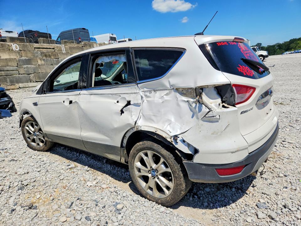 Photo 2 from auction – 2013 FORD ESCAPE with VIN 1FMCU0H95DUB07379