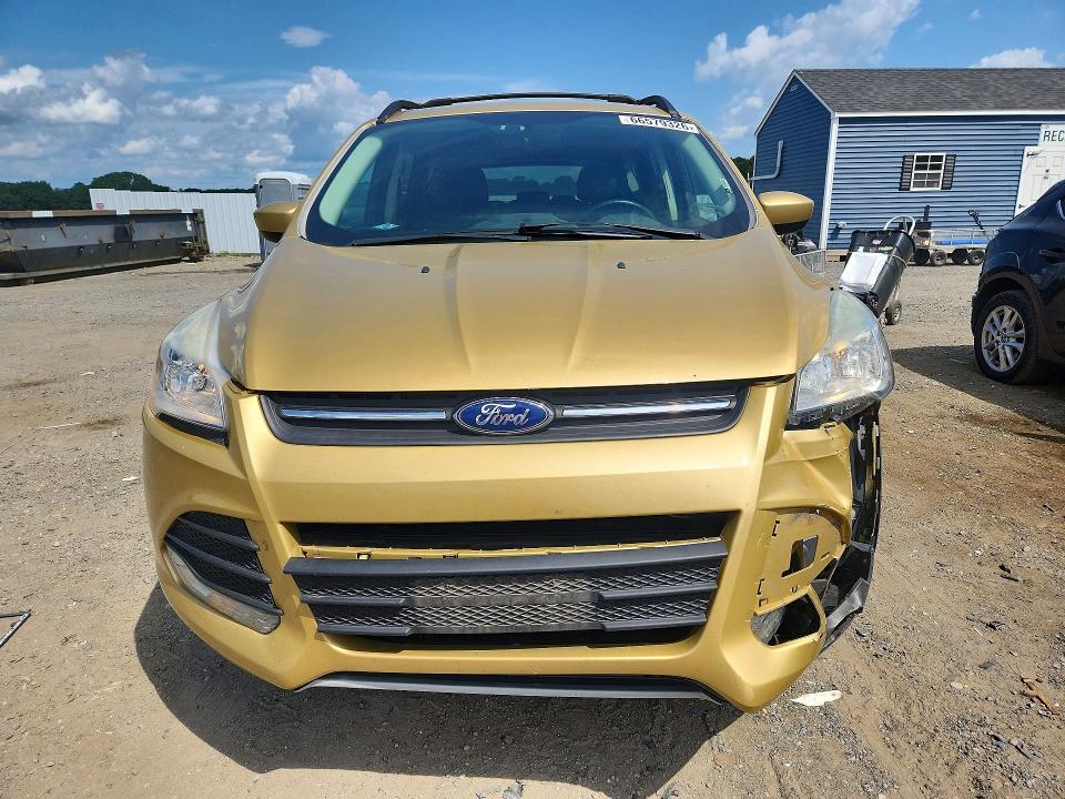 Photo 5 from auction – 2015 FORD ESCAPE with VIN 1FMCU9G90FUA34740