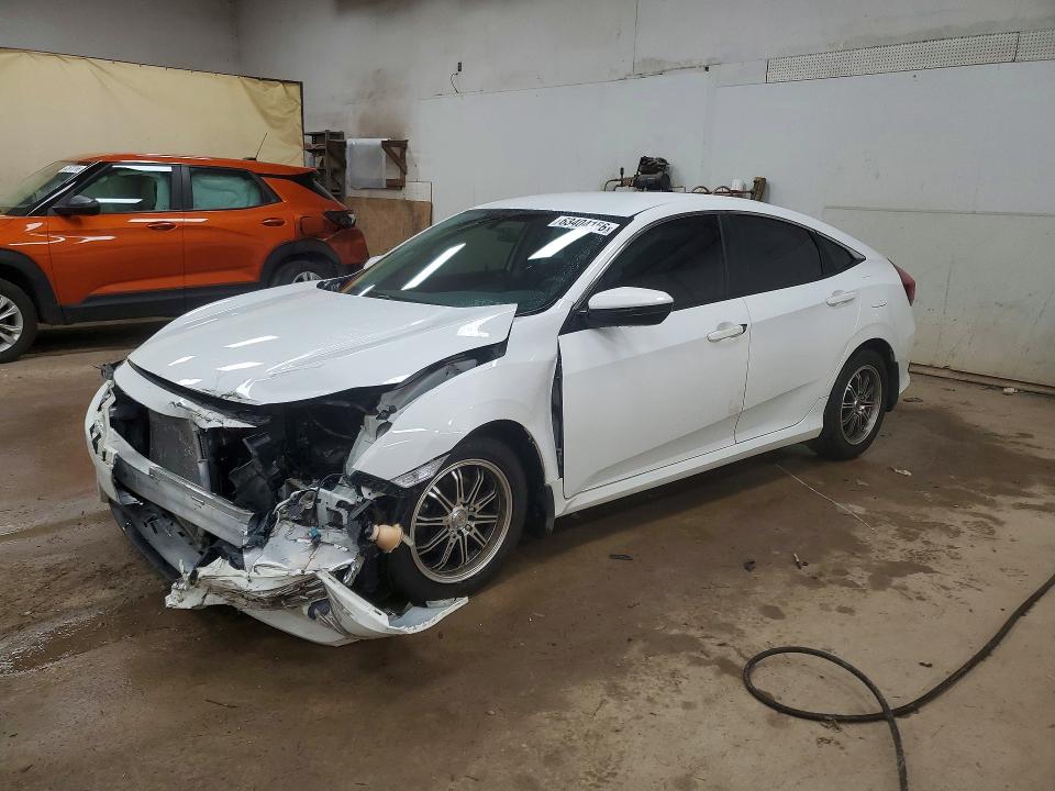 HONDA CIVIC 2016 with VIN 2HGFC2F52GH553563 - Photo from auction
