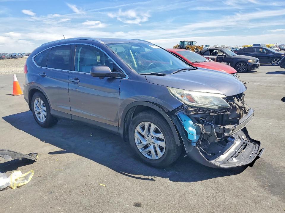 Photo 4 from auction – 2015 HONDA CR-V with VIN 2HKRM3H77FH503292