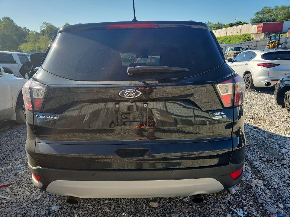 Снимка 6 от търг – 2018 FORD ESCAPE с VIN 1FMCU9HD0JUA89961