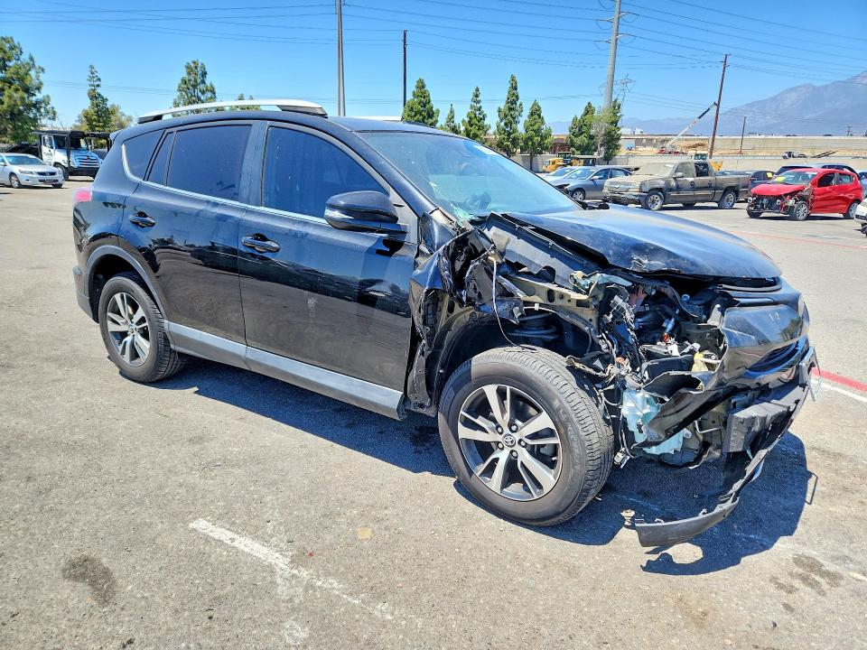 Photo 4 from auction – 2017 TOYOTA RAV4 with VIN 2T3WFREV9HW385275
