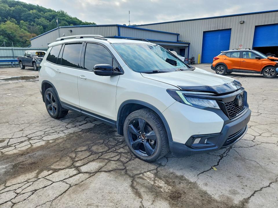 Photo 4 from auction – 2019 HONDA PASSPORT with VIN 5FNYF8H08KB001115