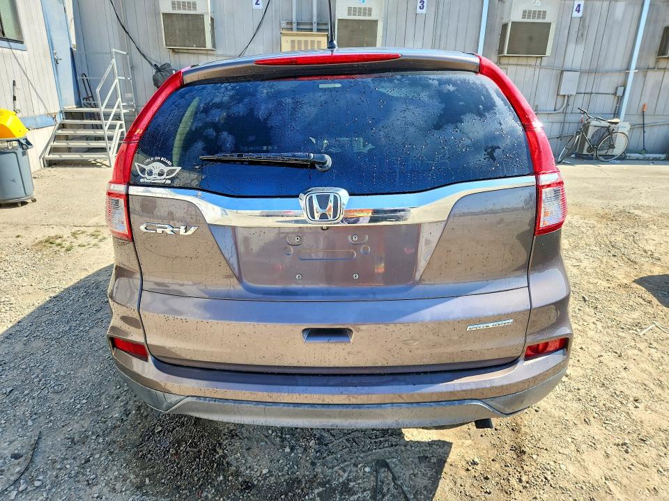Photo 6 from auction – 2016 HONDA CR-V with VIN 2HKRM3H48GH559572