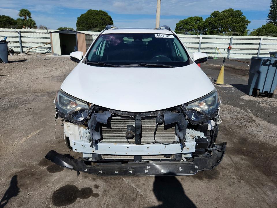Photo 5 from auction – 2018 TOYOTA RAV4 with VIN 2T3WFREVXJW494995