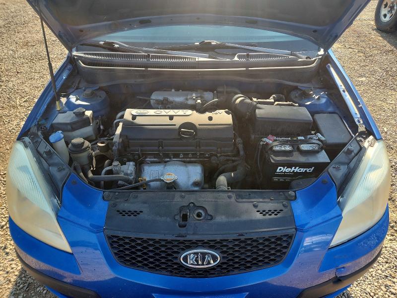 Photo 11 from auction – 2009 KIA RIO with VIN KNADE223396576100