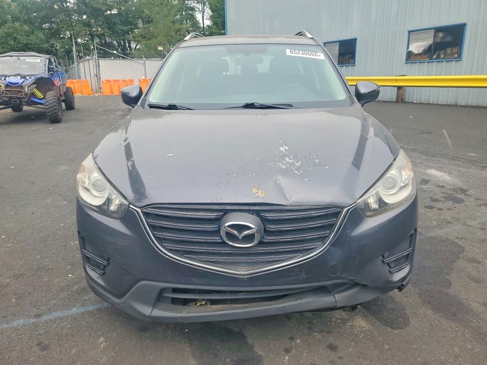 Photo 5 from auction – 2016 MAZDA CX-5 with VIN JM3KE4BY6G0876142