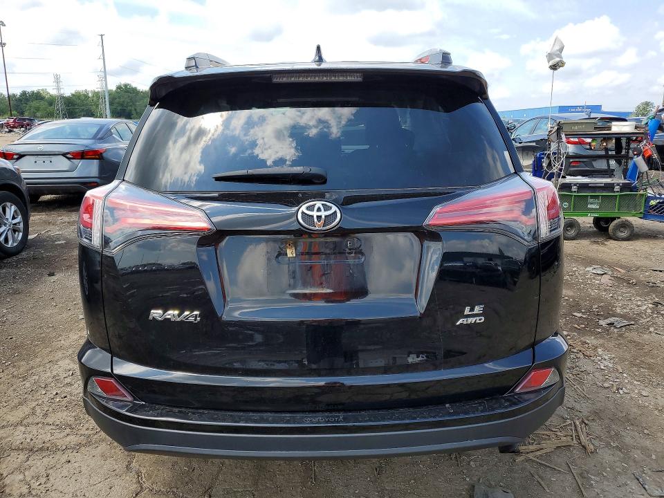 Photo 6 from auction – 2018 TOYOTA RAV4 with VIN 2T3BFREV2JW761092