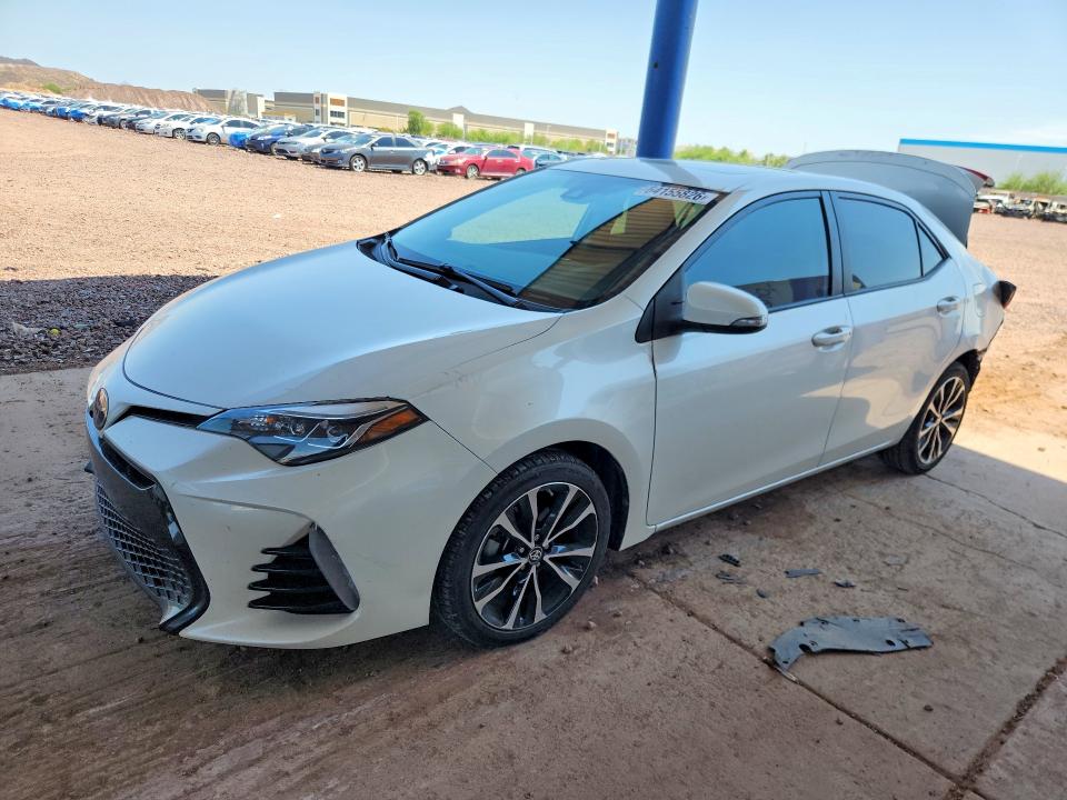 TOYOTA COROLLA 2018 с VIN 5YFBURHE6JP756151 - Фото с аукциона