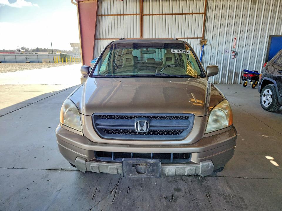 Photo 5 from auction – 2004 HONDA PILOT with VIN 2HKYF18504H518707