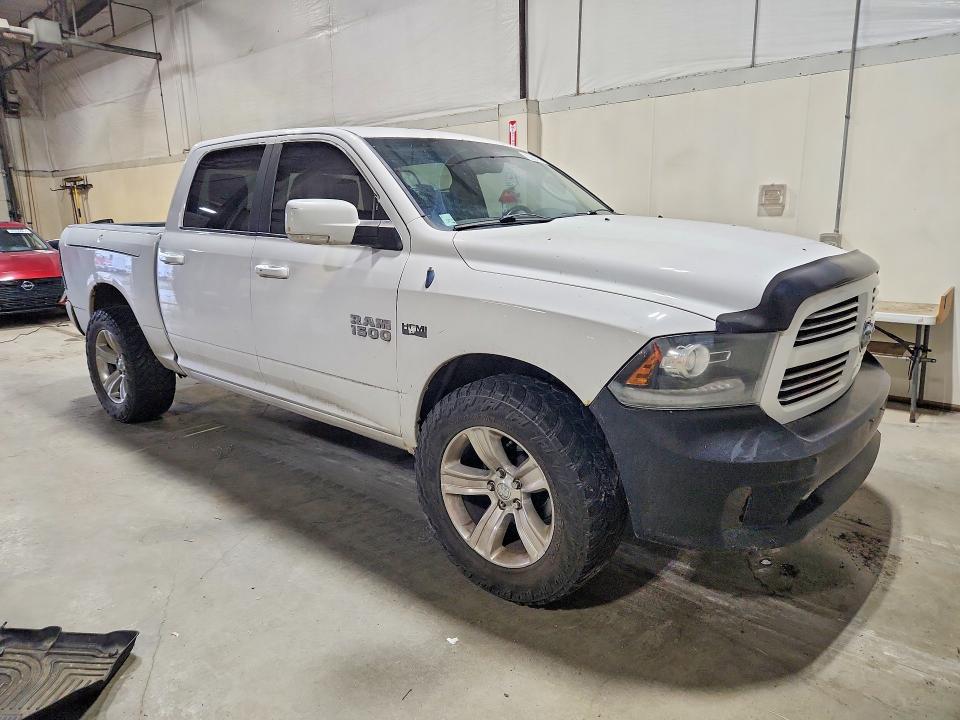 Photo 4 from auction – 2013 RAM 1500 with VIN 1C6RR7MT8DS552132