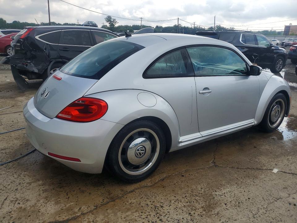 Photo 3 from auction – 2012 VOLKSWAGEN BEETLE with VIN 3VWJP7AT4CM613352