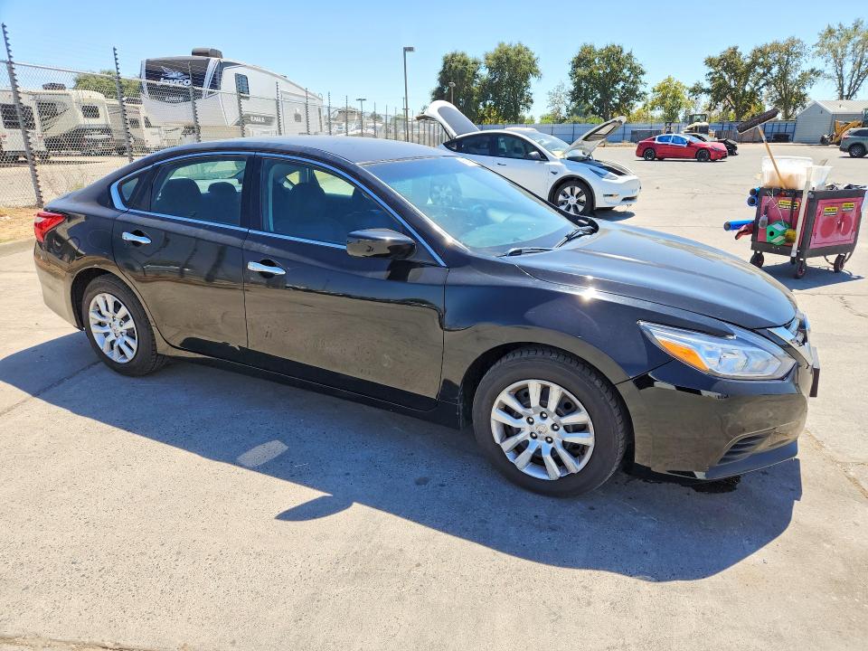 Photo 4 from auction – 2016 NISSAN ALTIMA with VIN 1N4AL3AP1GN365010