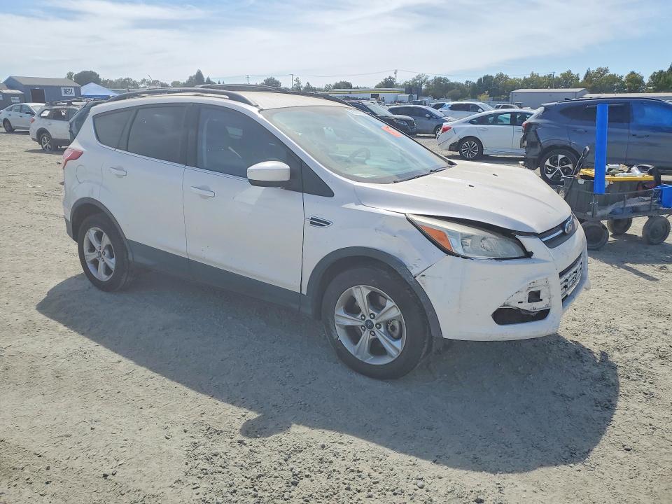 Photo 4 from auction – 2013 FORD ESCAPE with VIN 1FMCU0G97DUD18309