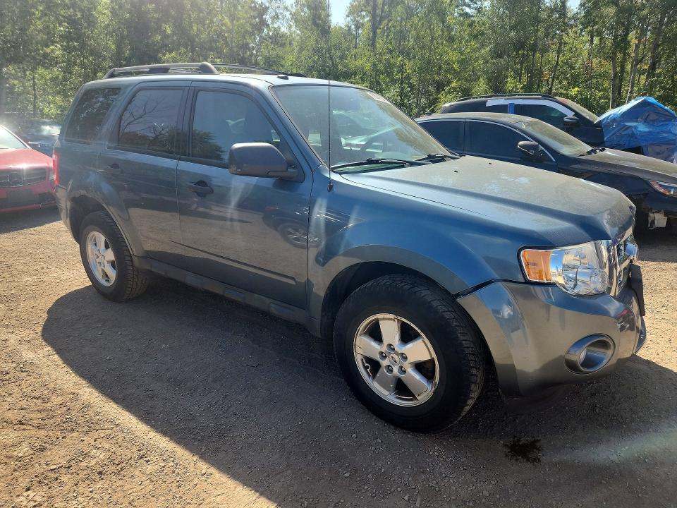 Photo 4 from auction – 2011 FORD ESCAPE with VIN 1FMCU0D72BKC33860