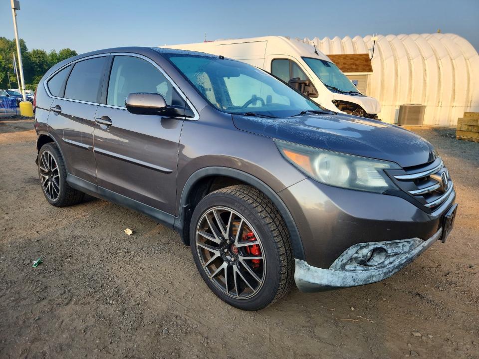 Photo 4 from auction – 2013 HONDA CR-V with VIN 5J6RM4H55DL039247