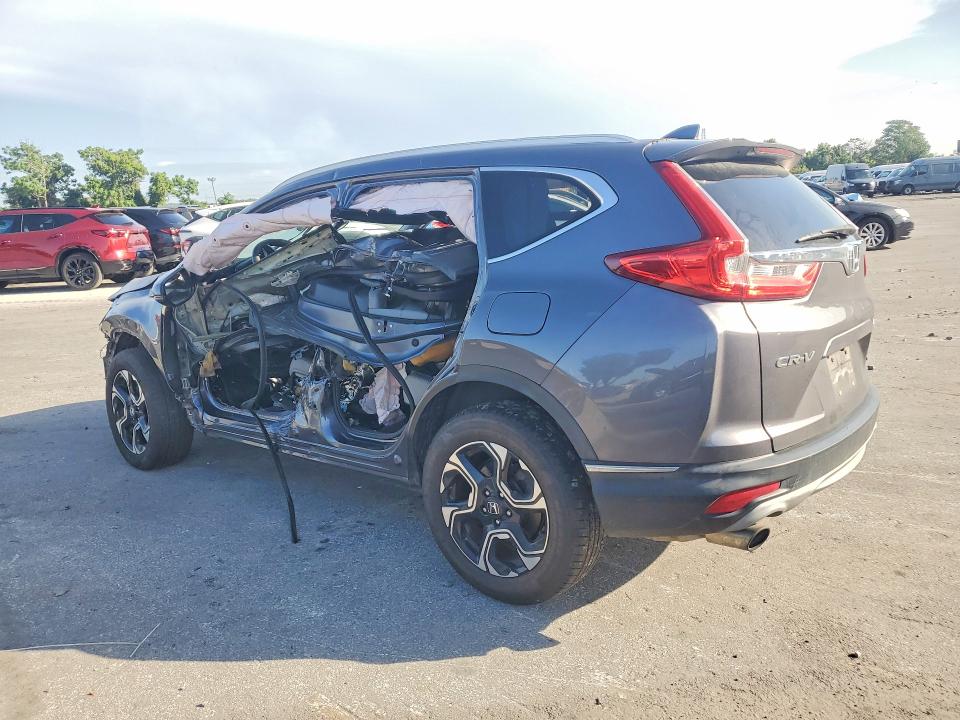 Photo 2 from auction – 2017 HONDA CR-V with VIN 2HKRW2H91HH612419
