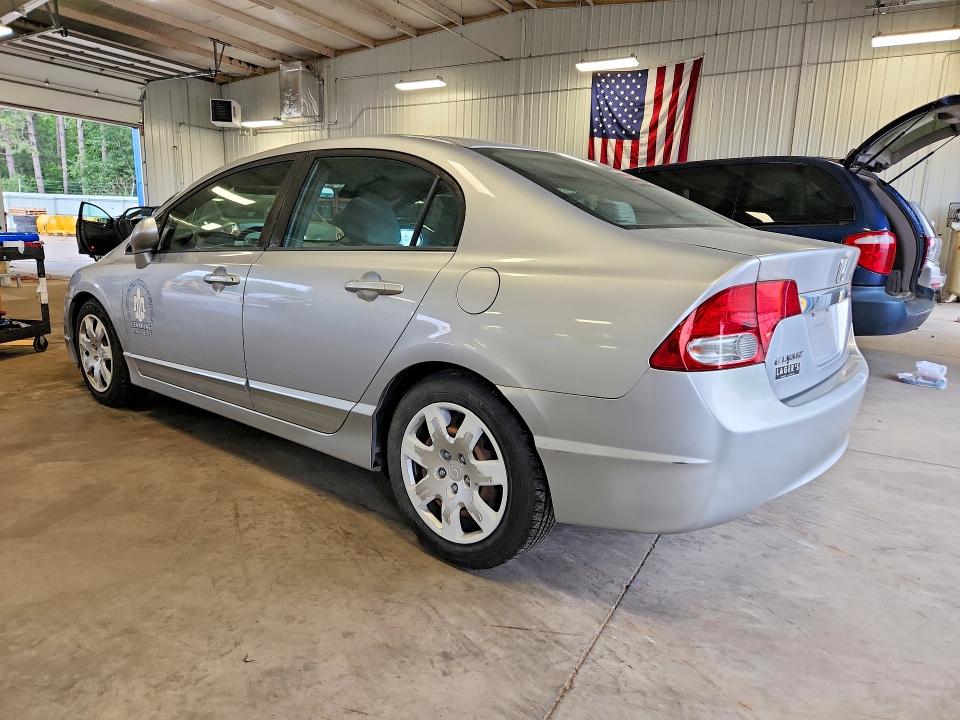 Photo 2 from auction – 2011 HONDA CIVIC with VIN 19XFA1F59BE030558