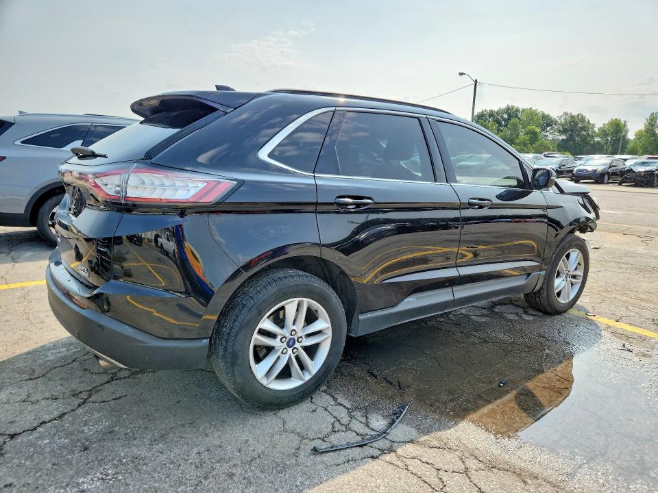 Photo 3 from auction – 2017 FORD EDGE with VIN 2FMPK4J95HBB45683