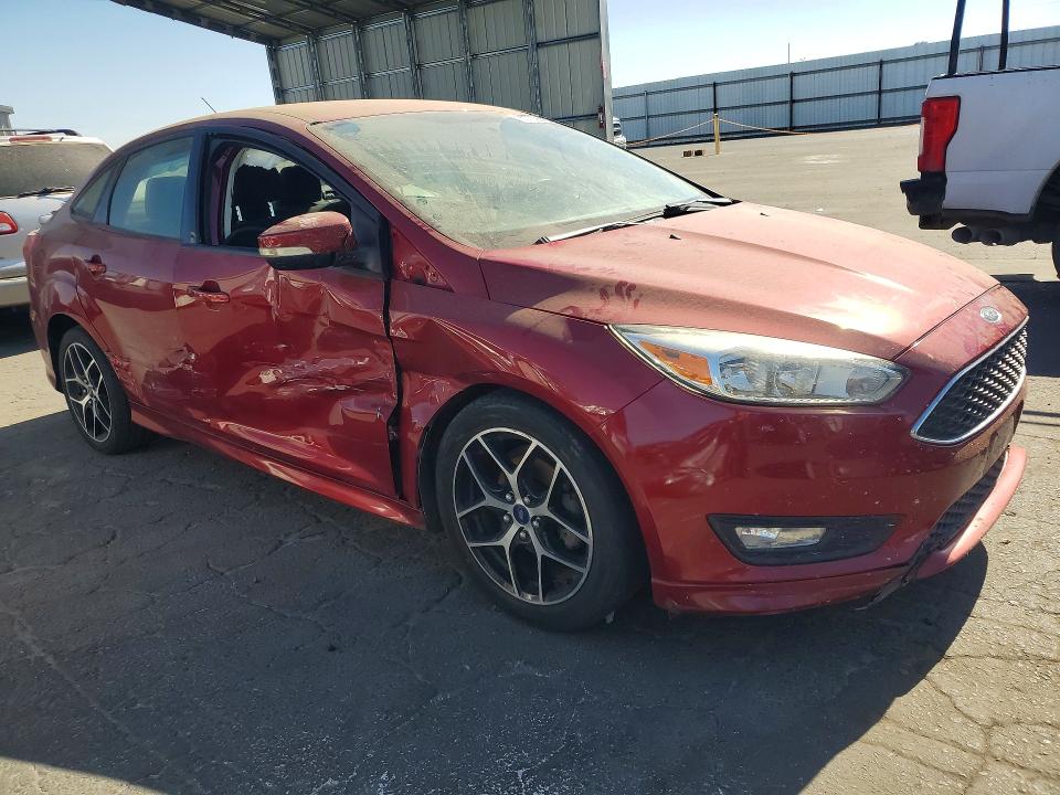 Photo 4 from auction – 2015 FORD FOCUS with VIN 1FADP3F26FL360216