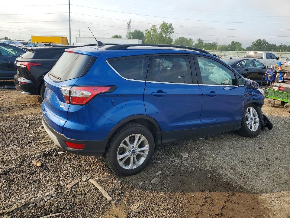 Photo 3 from auction – 2018 FORD ESCAPE with VIN 1FMCU9HD7JUD02873